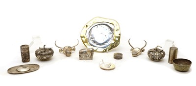 Lot 65 - A matched pair of silver bull's head sculptures