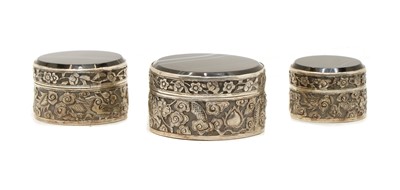 Lot 39 - A set of three graduated silver banded agate boxes