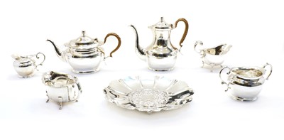 Lot 23 - Two four piece silver-plated tea and coffee sets
