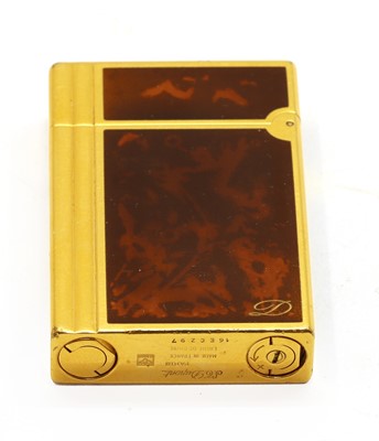 Lot 172 - A S.T. Dupont gilt metal lighter
