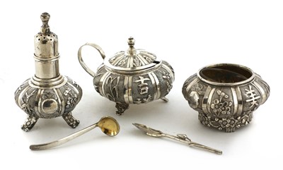 Lot 134 - A Chinese silver salt, mustard pot and pepper shaker set