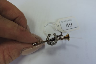 Lot 49 - A cased diamond set hunting horn, horseshoe and crop bar brooch, c.1900