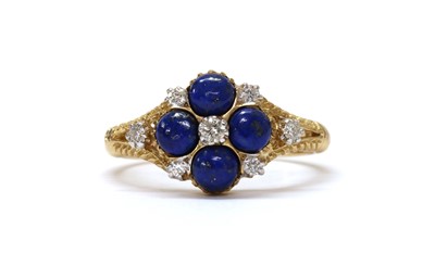 Lot 1303 - A 9ct gold diamond and lapis lazuli cluster ring
