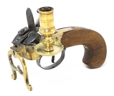 Lot 122A - A reproduction brass framed flintlock tinder-box