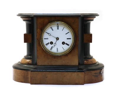 Lot 338 - A walnut and ebonised mantel clock