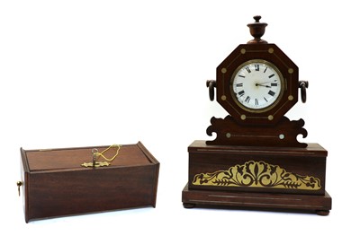 Lot 233 - A brass inlaid rosewood mantel clock