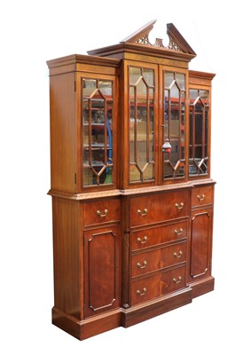 Lot 254 - A mahogany breakfront secretaire bookcase