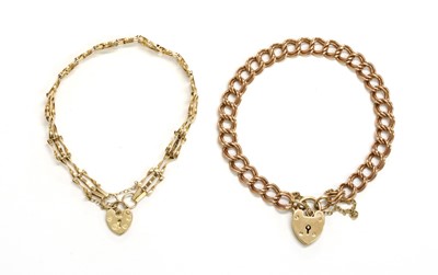 Lot 102 - A 9ct gold double curb link bracelet