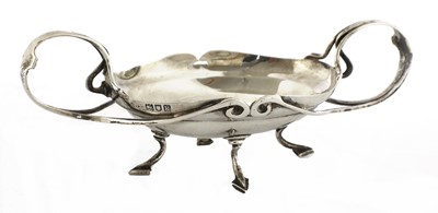 Lot 105 - An Arts and Crafts silver twin-handled bowl