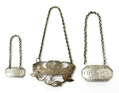 Lot 120 - A collection of silver spirit labels