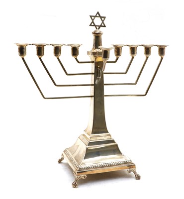 Lot 100 - A silver Menorah