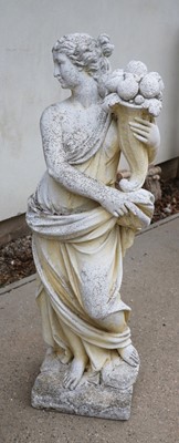 Lot 498 - A composite stone garden sculpture