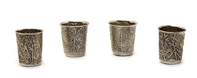 Lot 4 - A set of four antique Chinese silver vodka beakers