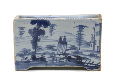 Lot 175 - An 18th century English Delft flower brick