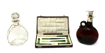 Lot 27 - Two silver topped decanters