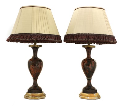 Lot 2 - A pair of polished hardstone table lamps