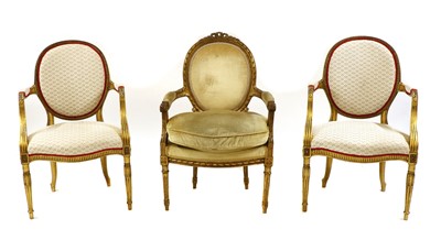 Lot 390 - A pair of French Louis XVI-style giltwood fauteuils