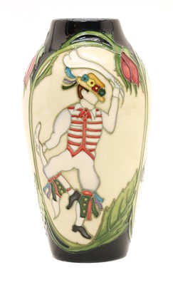 Lot 400 - A Moorcroft limited edition Thaxted Morris Dancers pattern vase
