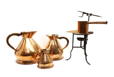 Lot 483 - Metalwares, comprising three 19th century copper harvest measures