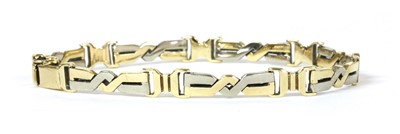 Lot 101 - A two colour gold bracelet