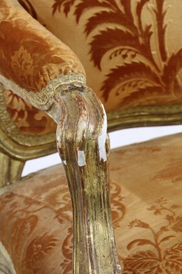 Lot 27 - A pair of French Louis XV giltwood fauteuils à la reine