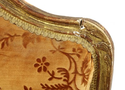 Lot 27 - A pair of French Louis XV giltwood fauteuils à la reine