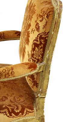 Lot 27 - A pair of French Louis XV giltwood fauteuils à la reine