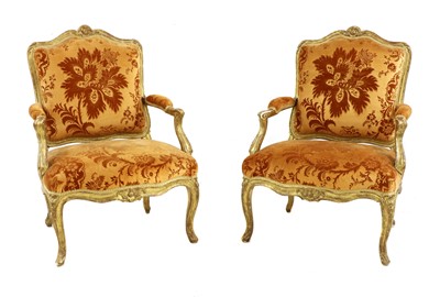 Lot 27 - A pair of French Louis XV giltwood fauteuils à la reine