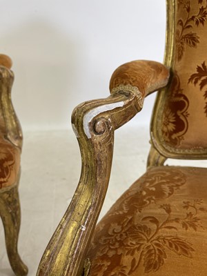 Lot 27 - A pair of French Louis XV giltwood fauteuils à la reine