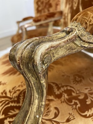Lot 27 - A pair of French Louis XV giltwood fauteuils à la reine