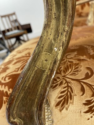 Lot 27 - A pair of French Louis XV giltwood fauteuils à la reine