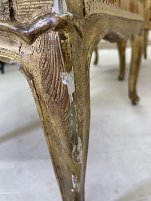 Lot 27 - A pair of French Louis XV giltwood fauteuils à la reine