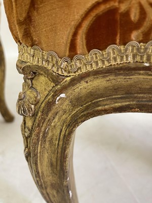 Lot 27 - A pair of French Louis XV giltwood fauteuils à la reine