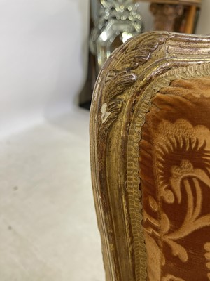 Lot 27 - A pair of French Louis XV giltwood fauteuils à la reine