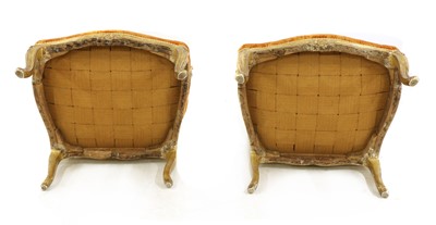 Lot 27 - A pair of French Louis XV giltwood fauteuils à la reine