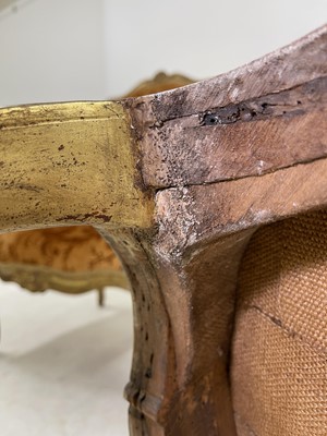 Lot 27 - A pair of French Louis XV giltwood fauteuils à la reine