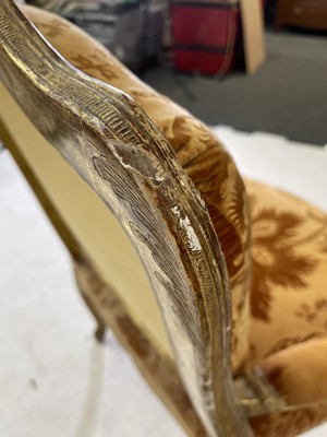 Lot 27 - A pair of French Louis XV giltwood fauteuils à la reine