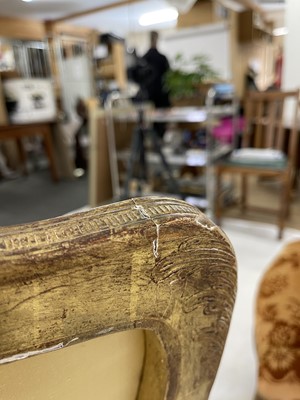 Lot 27 - A pair of French Louis XV giltwood fauteuils à la reine