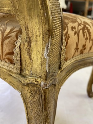 Lot 27 - A pair of French Louis XV giltwood fauteuils à la reine