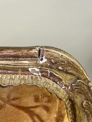 Lot 27 - A pair of French Louis XV giltwood fauteuils à la reine