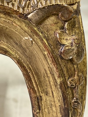 Lot 27 - A pair of French Louis XV giltwood fauteuils à la reine