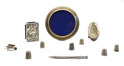 Lot 14 - A collection of novelty silver items