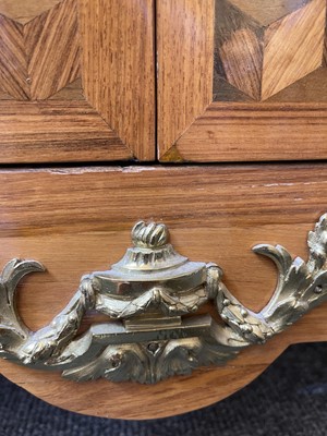 Lot 55 - A Royal French Louis XV kingwood, tulipwood, sycamore and parquetry inlaid meuble d'entrée