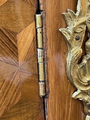 Lot 55 - A Royal French Louis XV kingwood, tulipwood, sycamore and parquetry inlaid meuble d'entrée