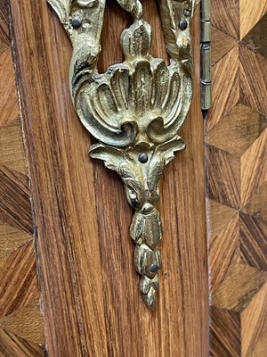 Lot 55 - A Royal French Louis XV kingwood, tulipwood, sycamore and parquetry inlaid meuble d'entrée