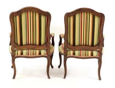 Lot 31 - A pair of French Louis XV beech fauteuils