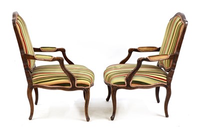 Lot 31 - A pair of French Louis XV beech fauteuils