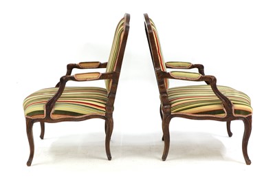 Lot 31 - A pair of French Louis XV beech fauteuils