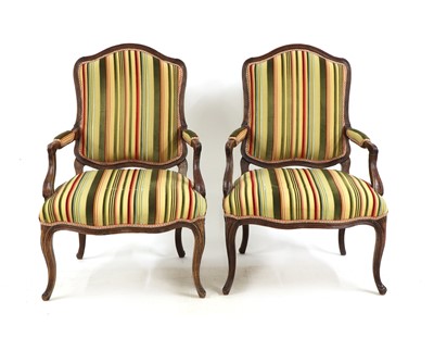 Lot 31 - A pair of French Louis XV beech fauteuils