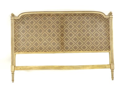 Lot 387A - A French Louis XVI-style painted and caned headboard